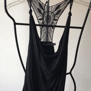 Black embroidered tank top.